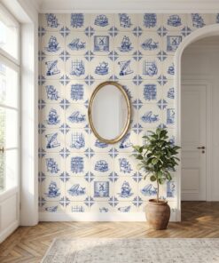 Bookish azulejo tile wallpaper in an entryway with a gold oval mirror and arched doorway