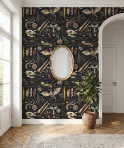 Black mythical creature specimen wallpaper in an entryway with a gold oval mirror