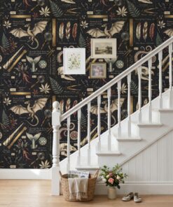 Dark academia naturalist creatures wallpaper on a staircase wall with a white banister and gallery frames