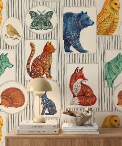 Close-up of folk art animal wallpaper with a patterned red fox, blue bear, copper cat, green wolf and hedgehog in frames on pinstripes