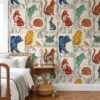 Folk art animal wallpaper in a kids bedroom with a wooden spindle bed and floating nightstand