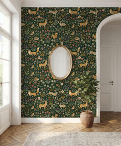 Millefleur tapestry wallpaper in an entryway with a gold oval mirror and arched doorway