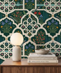 Close-up of emerald Mughal wallpaper with ivory jali arches, peacocks, blue iris, pomegranate trees and a lotus water channel