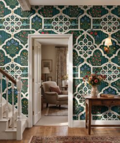 Emerald Mughal jali wallpaper in a hallway beside a white staircase and open doorway