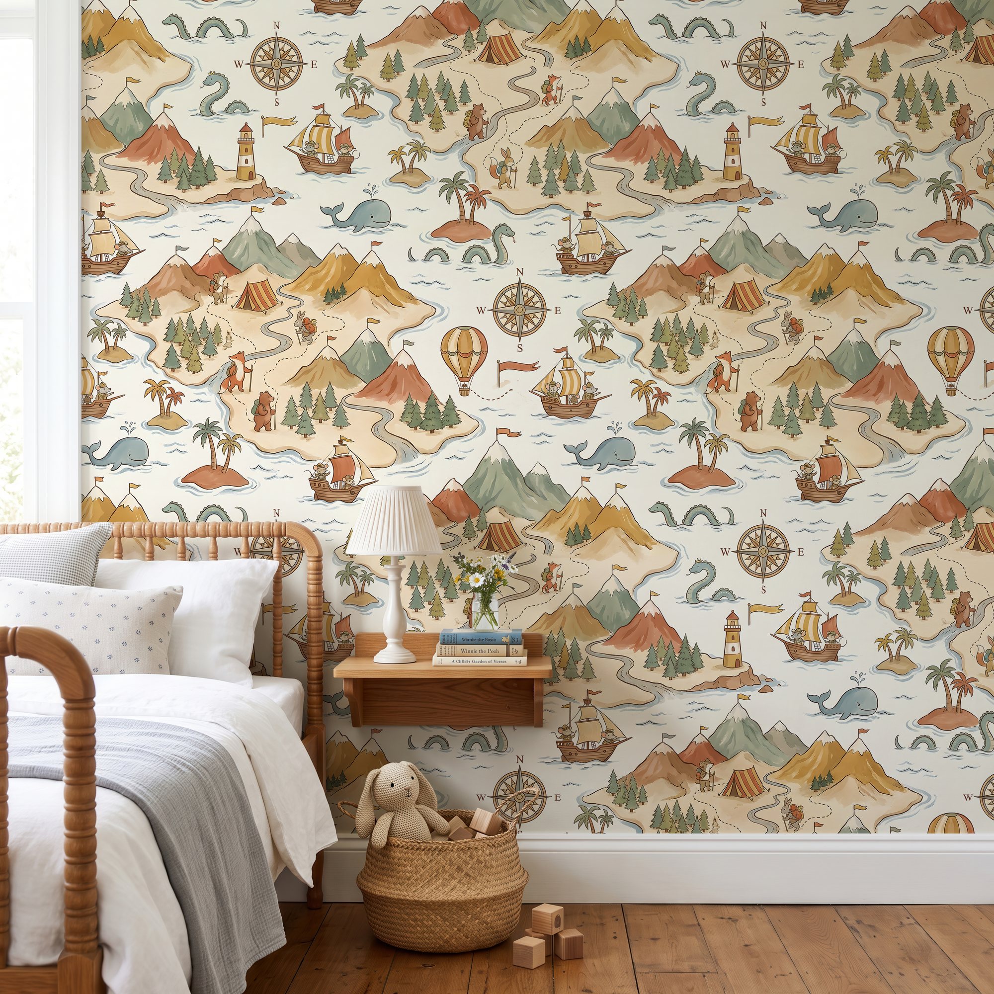 Kids map wallpaper with islands, mountains and compass roses in a bedroom with a wooden spindle bed