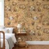 Woodland animal wallpaper with underground burrows in a kids bedroom with a wooden spindle bed
